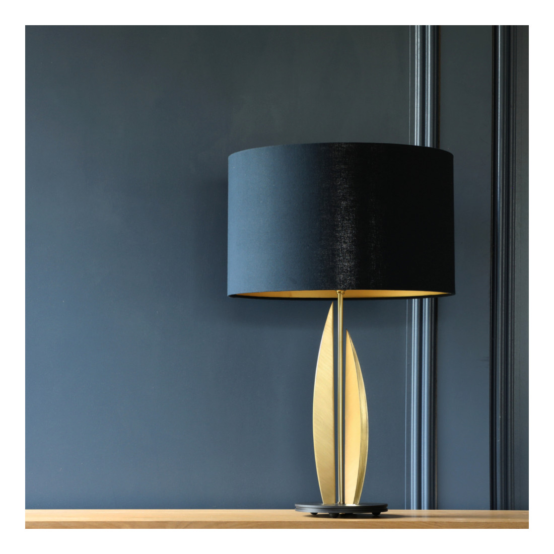 Folio Table Lamp in brushed brass on console table